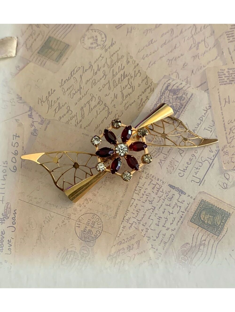 Vintage Red Rhinestone Bow Brooch with Openwork Filigree Wings